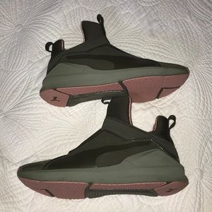 Army green and pink high top pumas